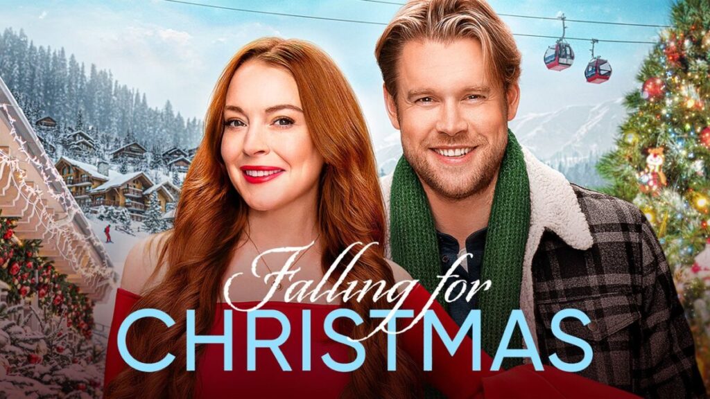 Eine Frau und ein Mann lächelnd vor der Kulisse eines Winterortes mit Chalets, einer Gondelbahn und einem Weihnachtsbaum.