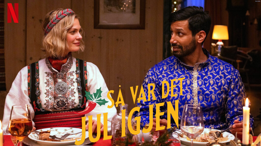 Poster mit Schriftzug. Ein Frau in traditioneller norwegischer Tracht und ein Mann in traditionell indischer Tracht sitzen am Festtagstisch und schauen sich an. 