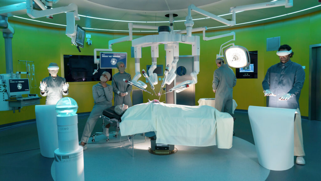 Futuristischer Operationssaal mit zwei Ärtz:innen, die an Pulten stehen und mit ihren Handbewegungen einen OP-Roboter in der Mitte des Saals bedienen.
