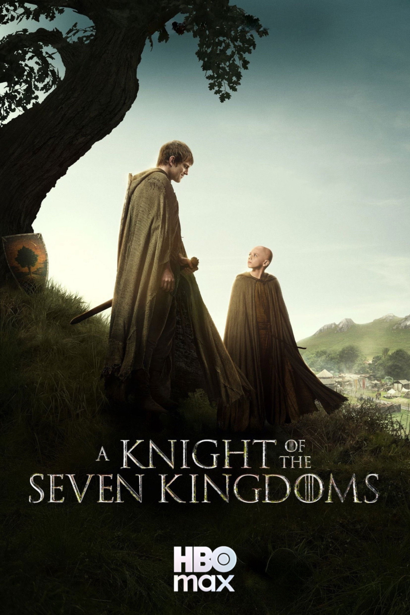 Zwei Männer in braunen Umhängen stehen unter einem grossen Baum auf einem Hügel. Der grössere Mann blickt auf den kleineren herab. Im Hintergrund eine mittelalterliche Siedlung und Berge bei Sonnenuntergang.