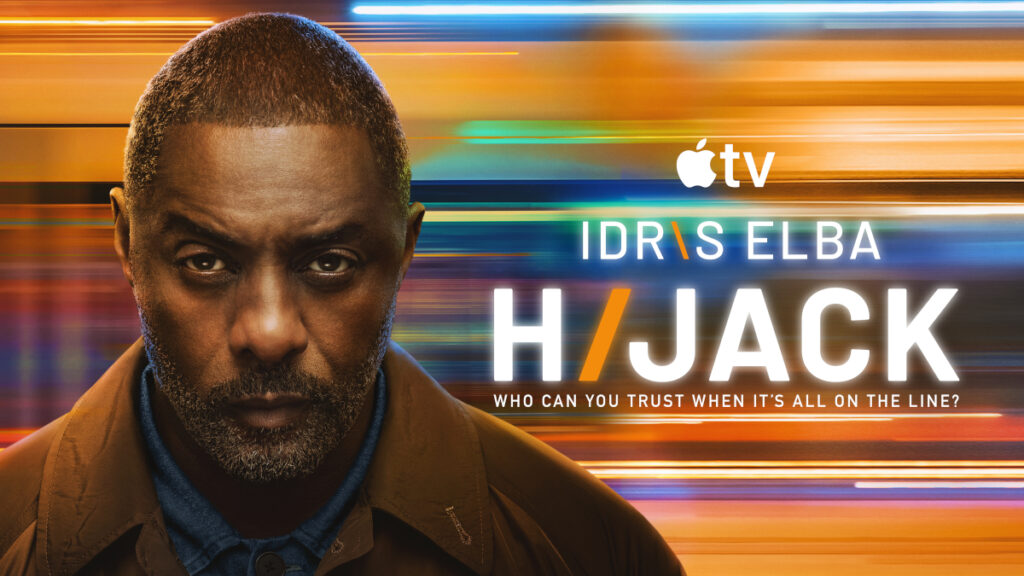 Poster der Apple TV+-Serie «Hijack» mit Idris Elba. Zu sehen ist ein Mann in brauner Jacke vor einem Hintergrund aus bunten, horizontalen Lichtstreifen in Orange-, Blau- und Gelbtönen. Der Titel «HIJACK» und der Slogan «Who can you trust when it's all on the line?» sind prominent platziert.