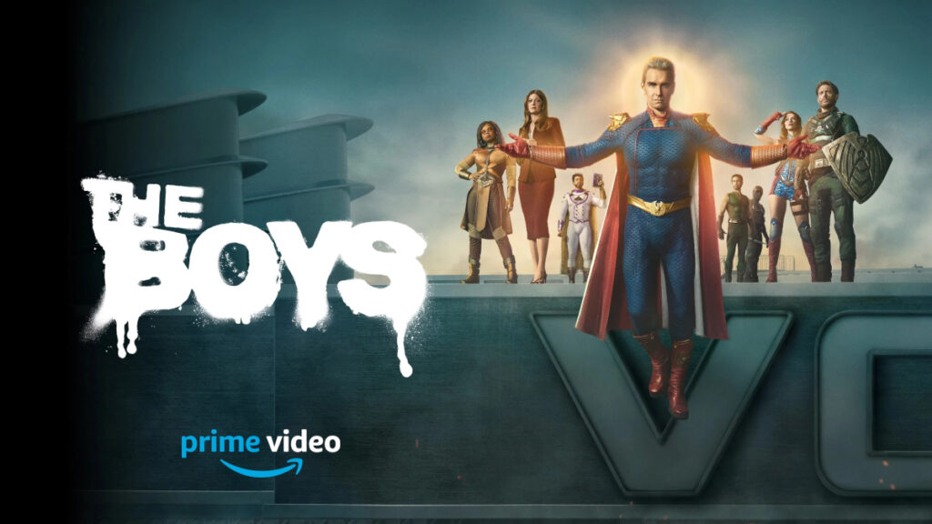 Poster für die Amazon Prime Video Serie «The Boys». Im Zentrum steht eine Superheldenfigur mit blauem Kostüm und rotem Umhang, umgeben von anderen Charakteren auf einem grossen «V»-Logo. Links ist der Serientitel in weisser, tropfender Schrift zu sehen.
